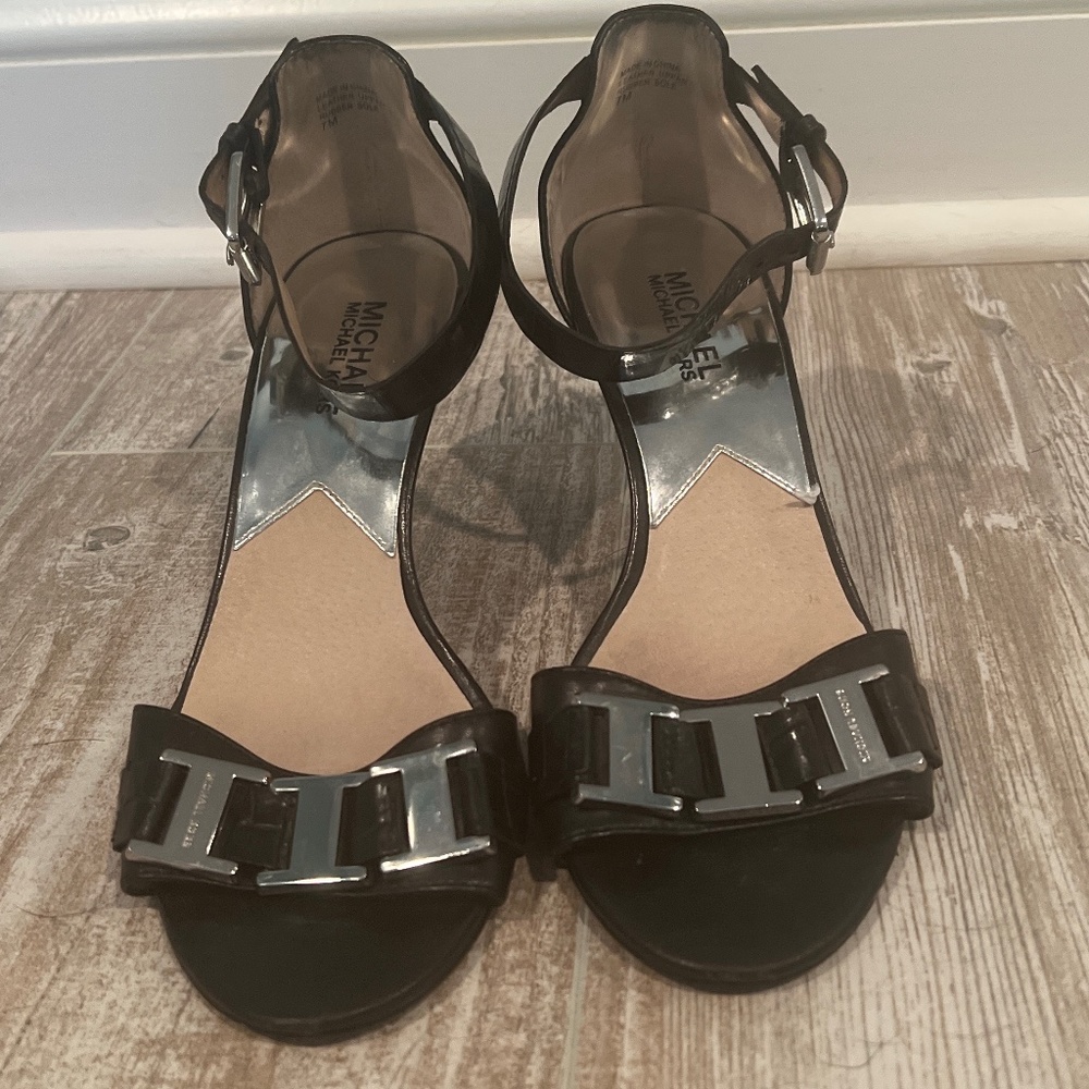 Black sandal heels with silver chain link